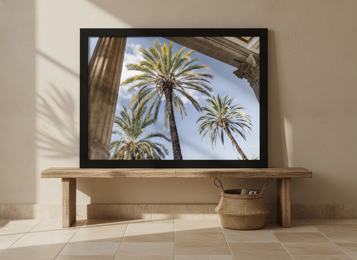 Modern wall art print standing on a bench in a Mediterranean bedroom