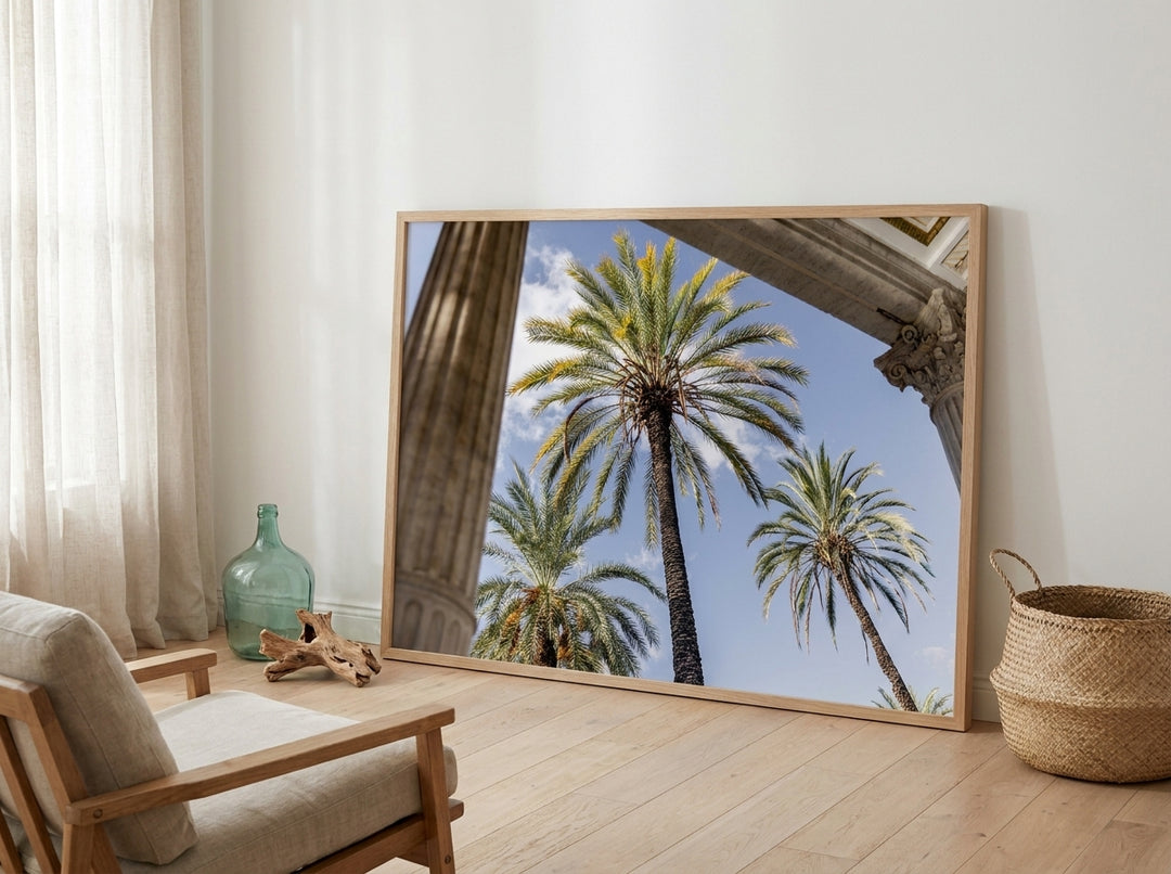 Oversized statement modern wall art print leaning against the wall in a coastal living room