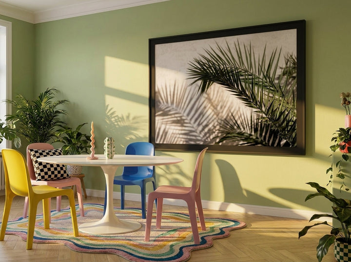 Oversized statement modern wall art print styled on the wall in a colourful eclectic dining room