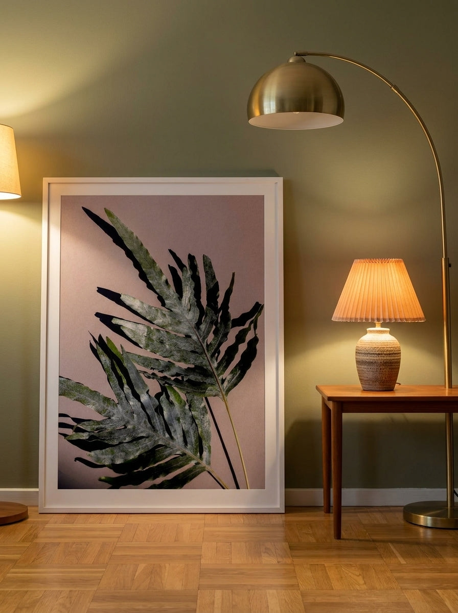 Modern wall art print leaning against the wall in a mid-century living room