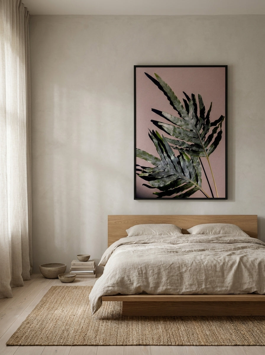 Oversized statement modern wall art print styled on the wall in a warm Japandi bedroom