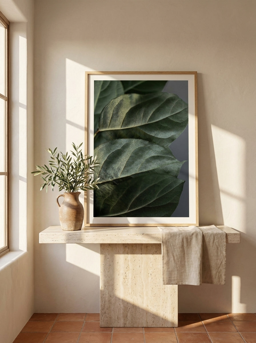 Modern wall art print standing on a console in a Mediterranean bathroom