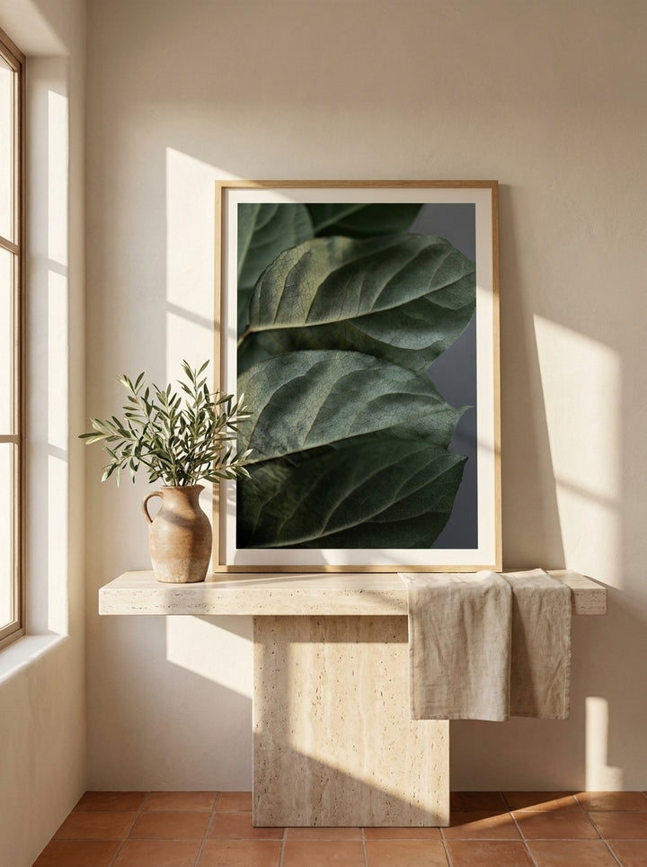 Modern wall art print standing on a console in a Mediterranean bathroom