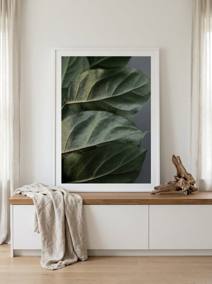 Modern wall art print standing on a kitchen bench in a coastal kitchen