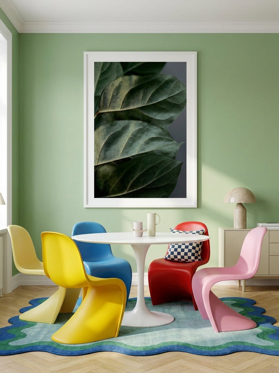 Oversized statement modern wall art print styled on the wall in a colourful eclectic dining room