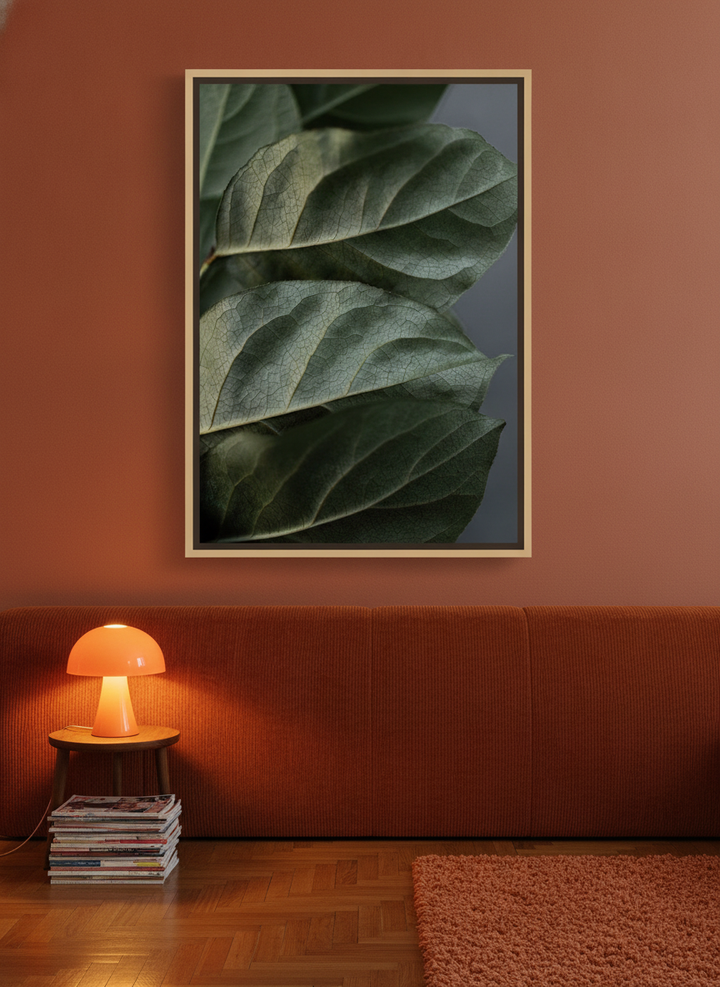 Oversized statement canvas wall art with a natural timber surround styled on the wall in a retro 70s bedroom
