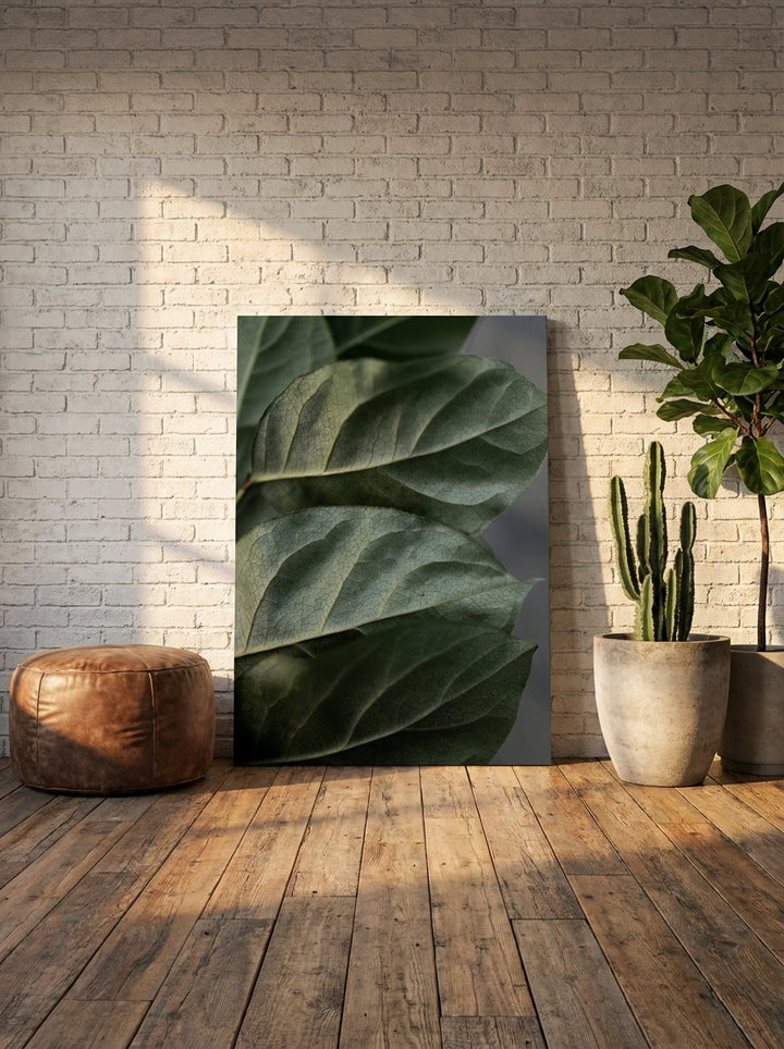 Stretched canvas wall art leaning against the wall in an industrial loft living room