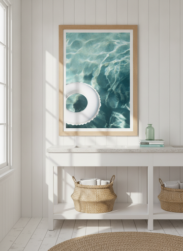 Modern wall art print styled on the wall in a coastal bathroom