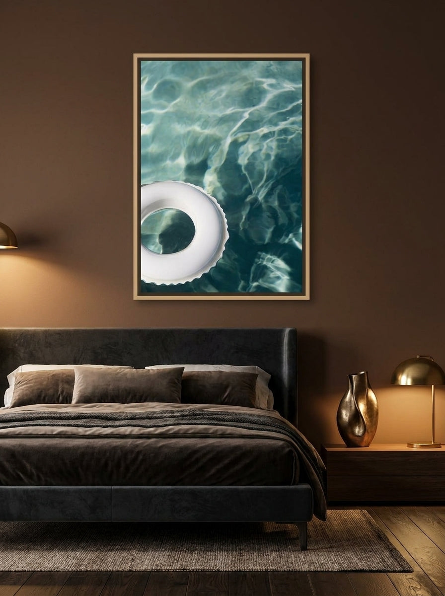 Canvas wall art with a natural timber surround styled on the wall in a moody bedroom