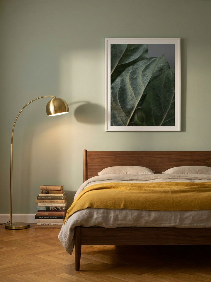 Modern wall art print styled on the wall in a mid-century bedroom