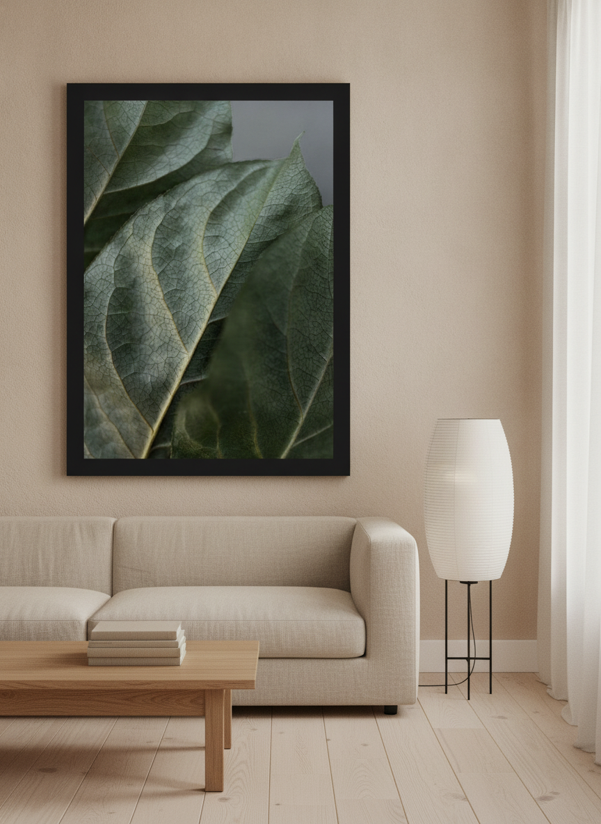 Oversized statement modern wall art print styled on the wall in a warm Japandi living room