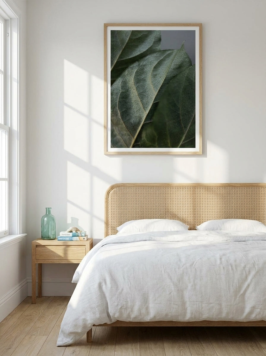 Modern wall art print styled on the wall in a coastal bedroom