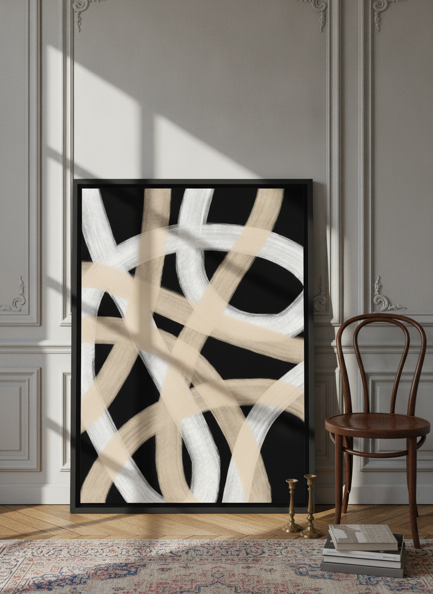Canvas wall art with a black surround leaning against the wall in a Parisian bedroom