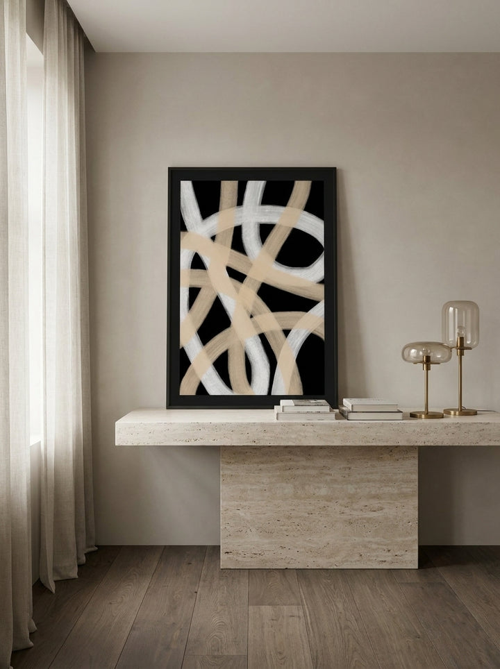 Modern wall art print standing on a console in a luxe home office