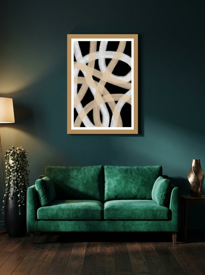 Modern wall art print styled on the wall in a moody living room