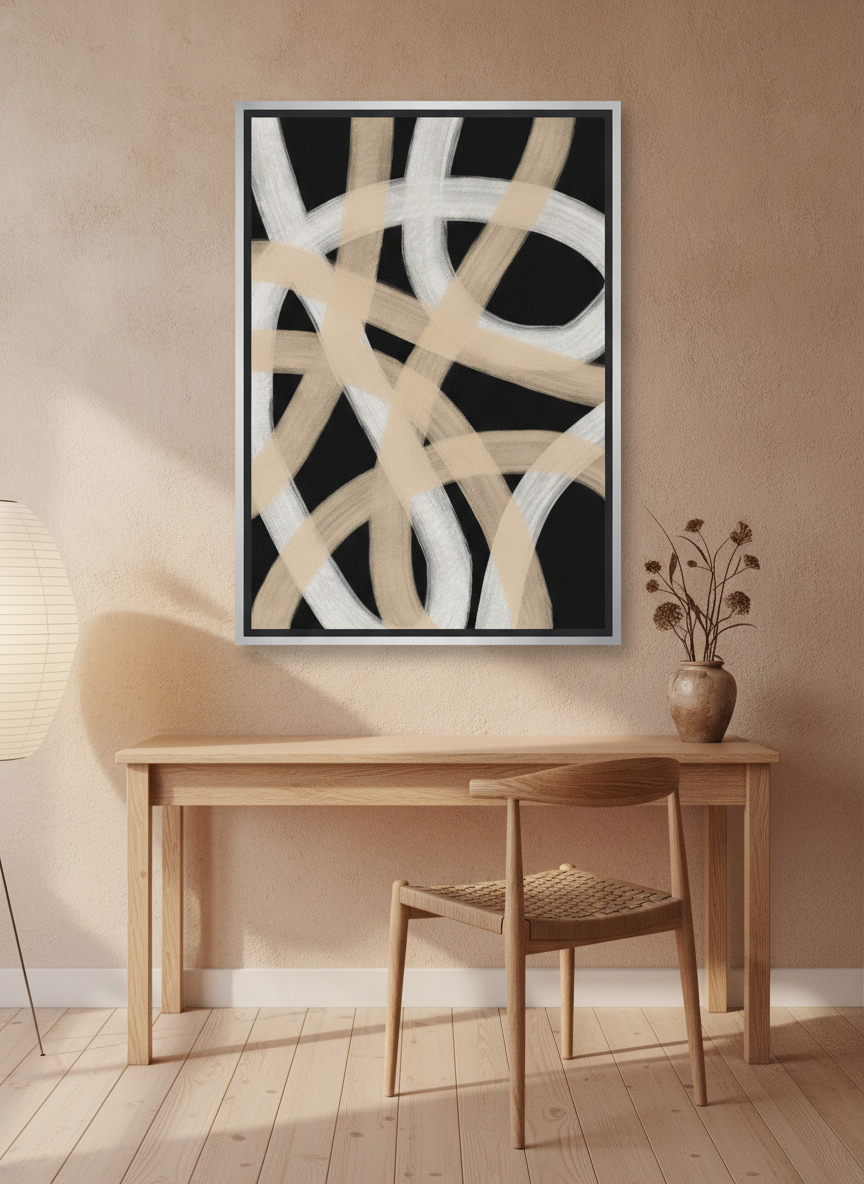 Canvas wall art with a silver leaf surround styled on the wall in a warm Japandi home office