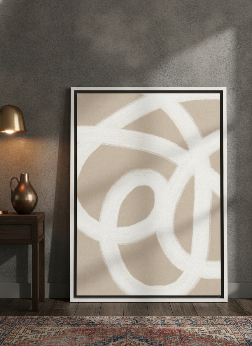 Canvas wall art with a white surround leaning against the wall in a moody bedroom