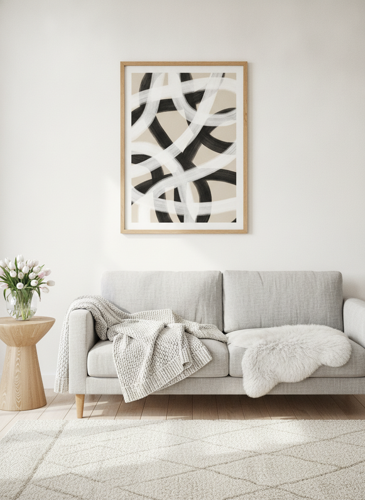 Modern wall art print styled on the wall in a bright Scandinavian living room