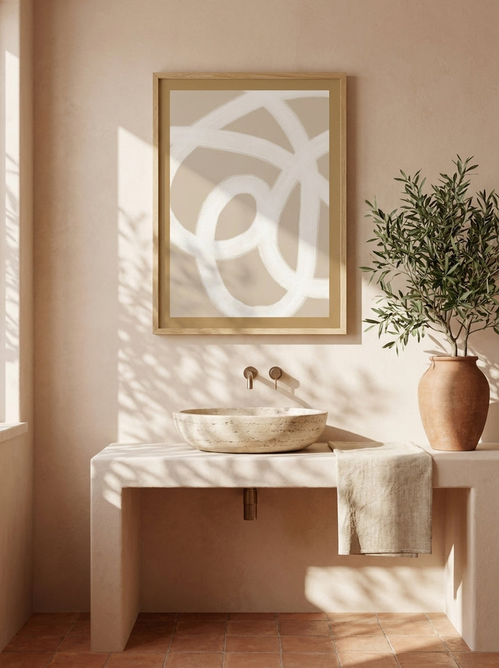 Modern wall art print styled on the wall in a Mediterranean bathroom