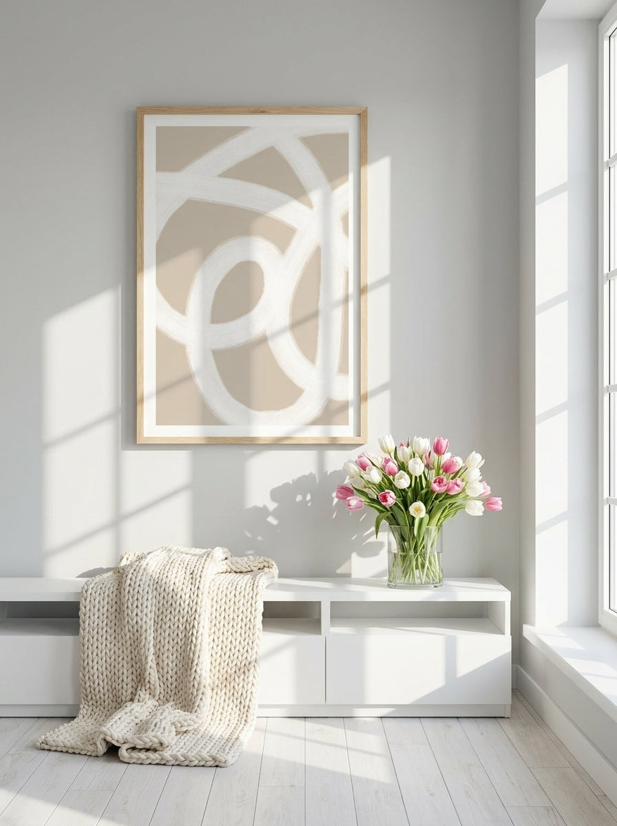 Modern wall art print styled on the wall in a bright Scandinavian living room