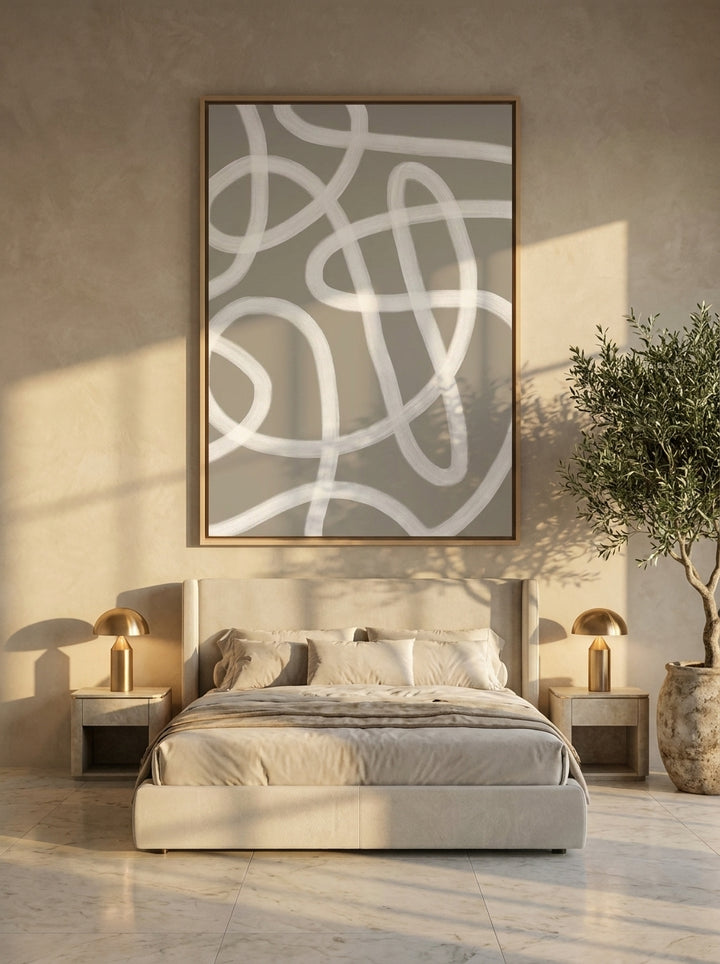 Oversized statement canvas wall art with a natural timber surround styled on the wall in a luxe bedroom