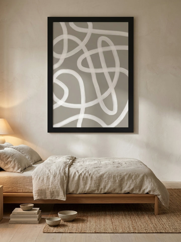 Oversized statement modern wall art print styled on the wall in a warm Japandi bedroom