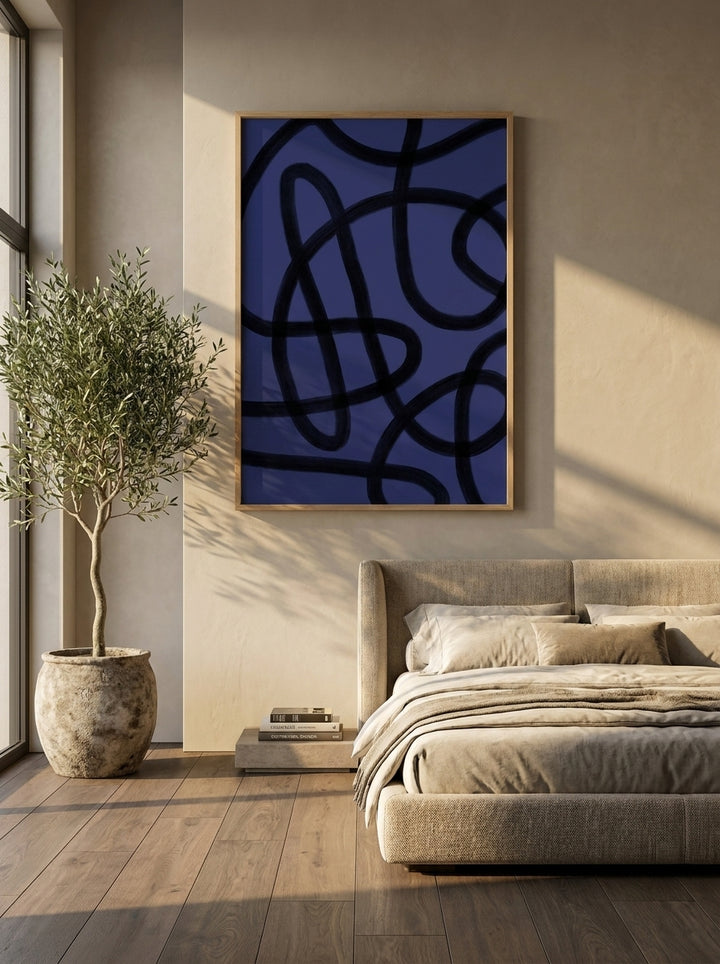 Oversized statement modern wall art print styled on the wall in a luxe bedroom