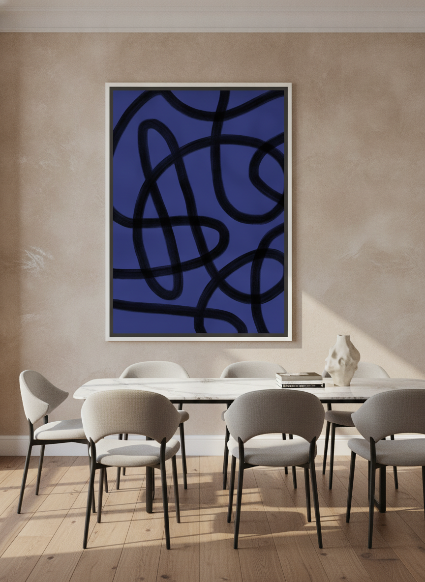 Oversized statement canvas wall art with a white surround styled on the wall in a luxe dining room