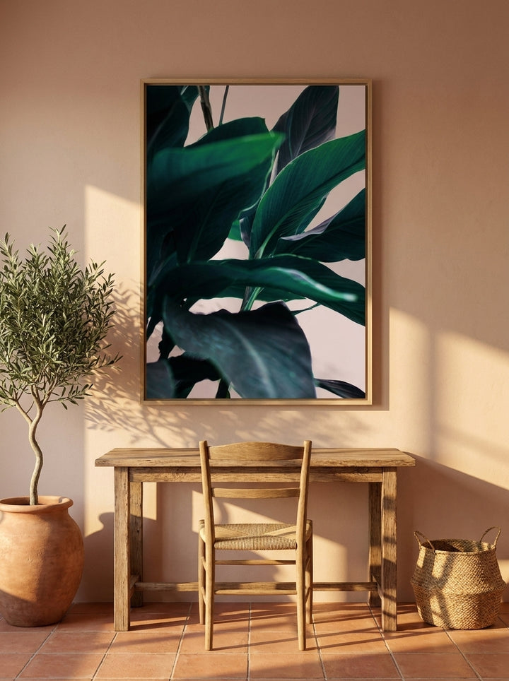 Oversized statement canvas wall art with a natural timber surround styled on the wall in a Mediterranean home office