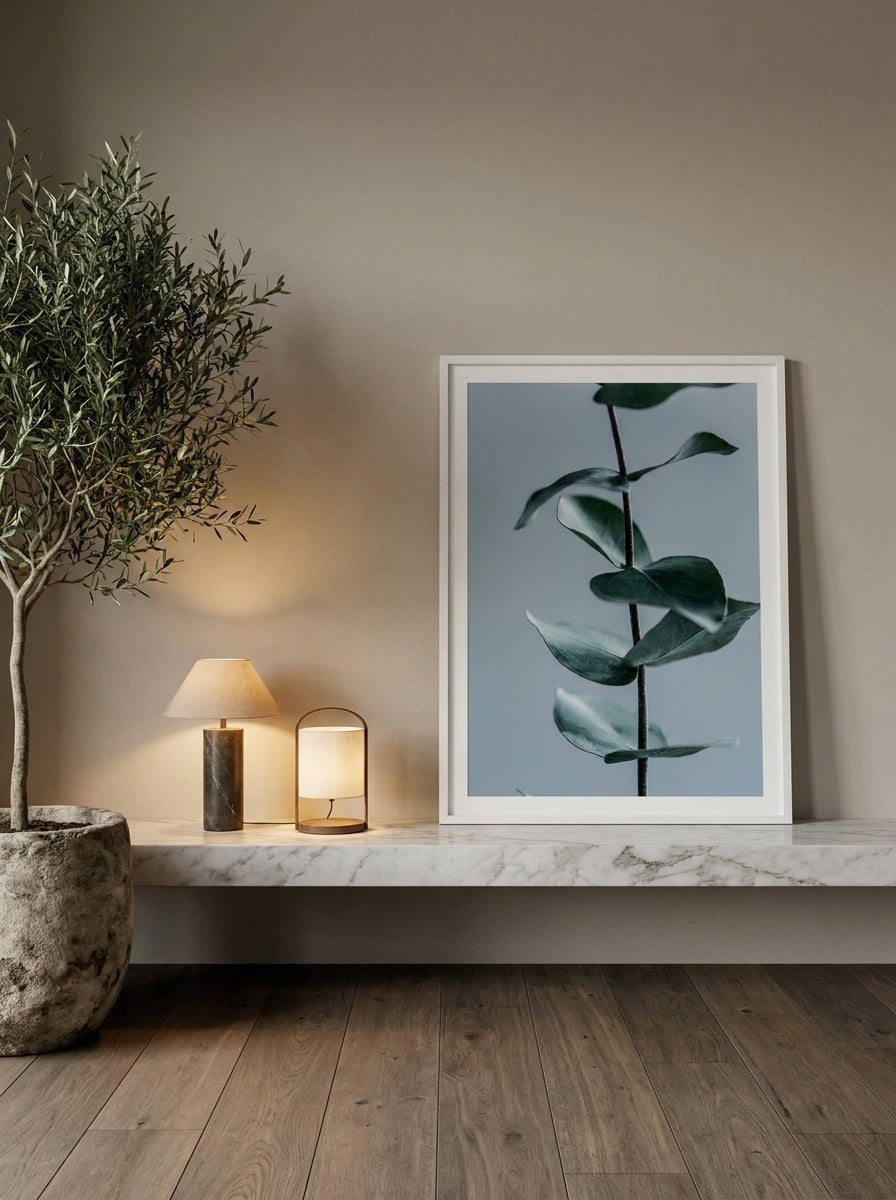 Modern wall art print standing on a kitchen bench in a luxe kitchen