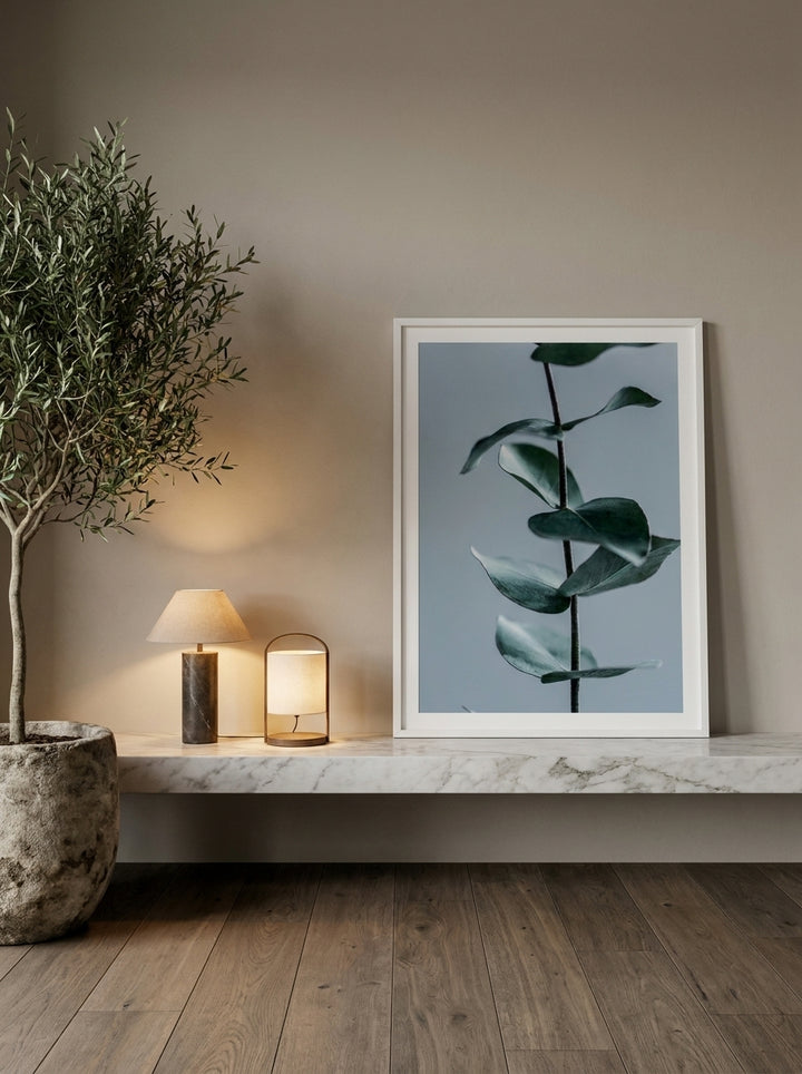 Modern wall art print standing on a kitchen bench in a luxe kitchen