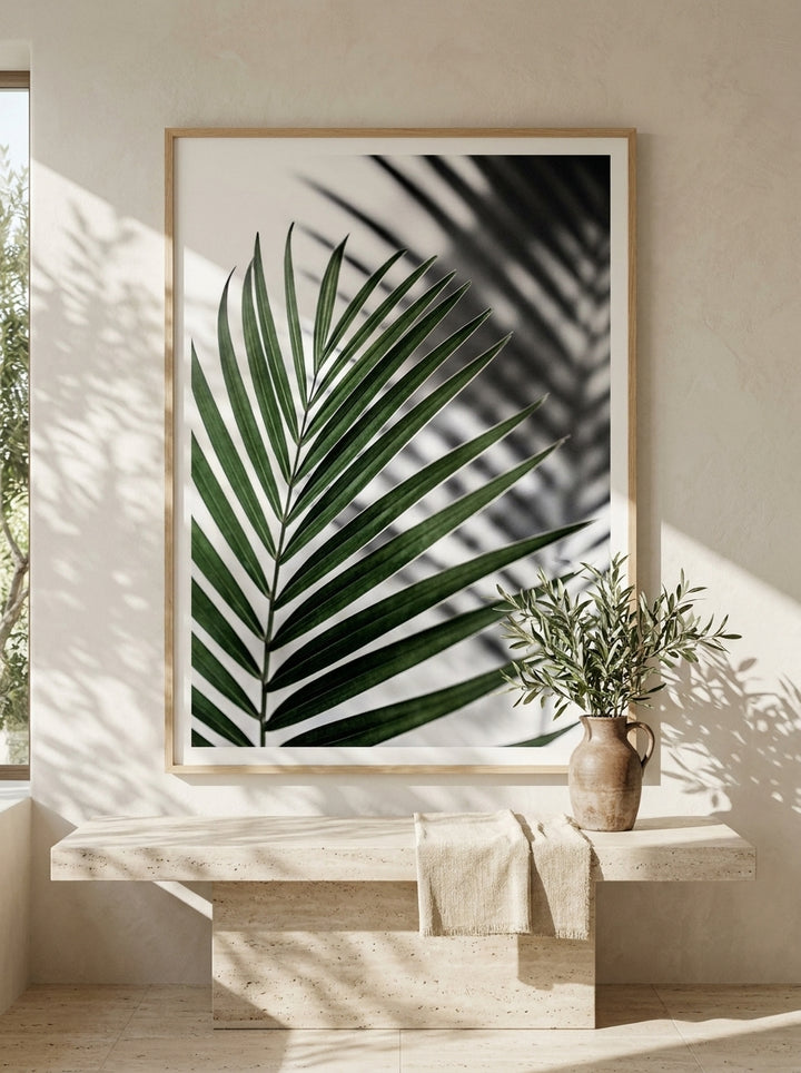 Modern wall art print styled on the wall in a Mediterranean living room
