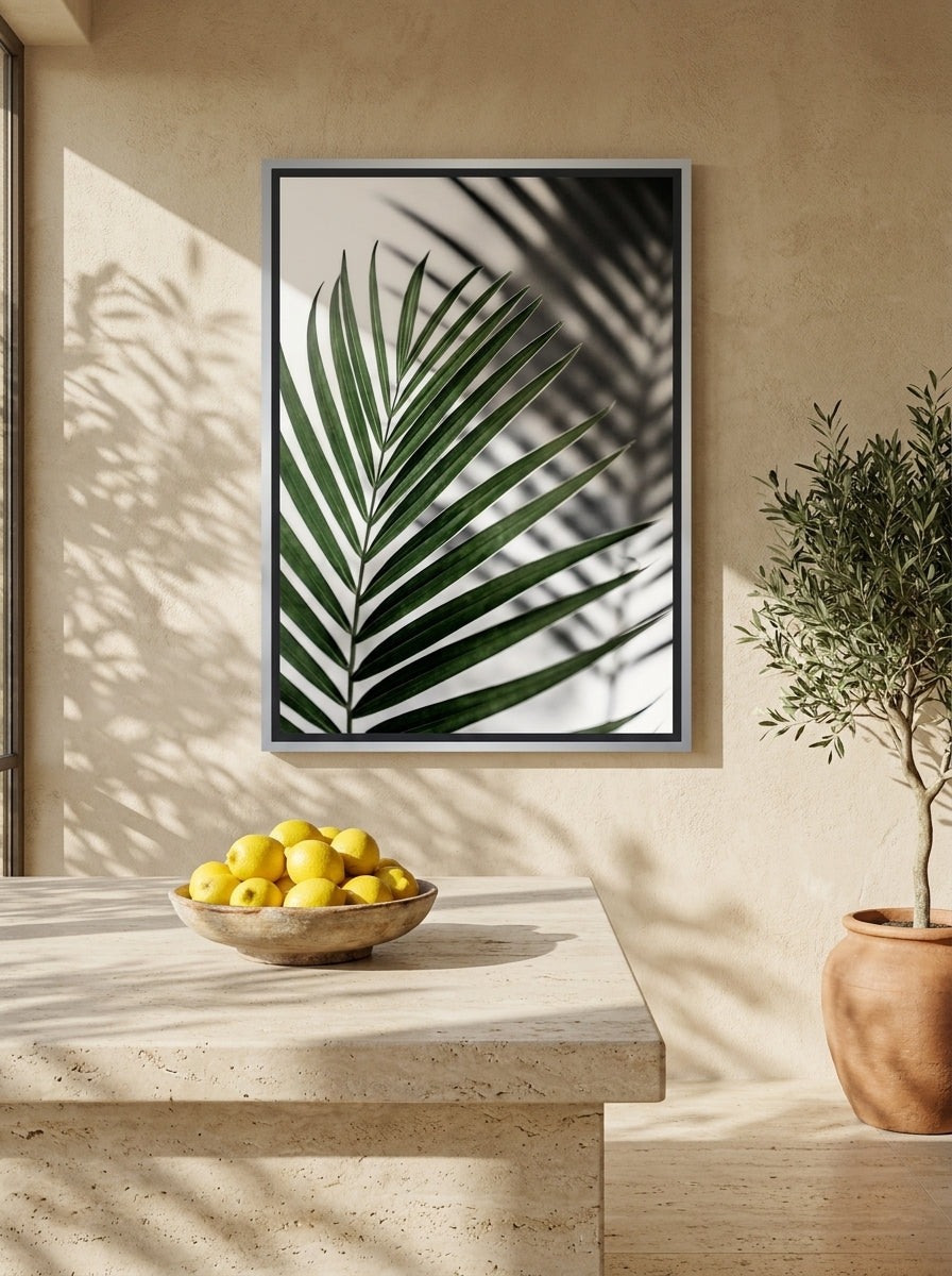 Canvas wall art with a silver leaf surround styled on the wall in a Mediterranean kitchen