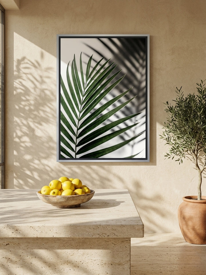 Canvas wall art with a silver leaf surround styled on the wall in a Mediterranean kitchen
