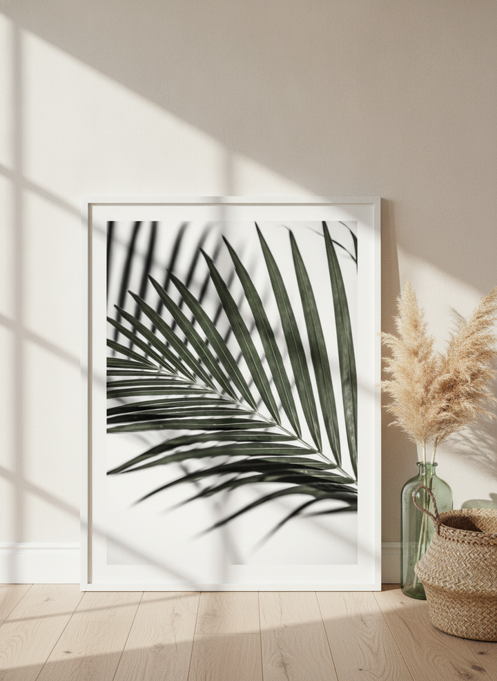 Modern wall art print leaning against the wall in a coastal bathroom