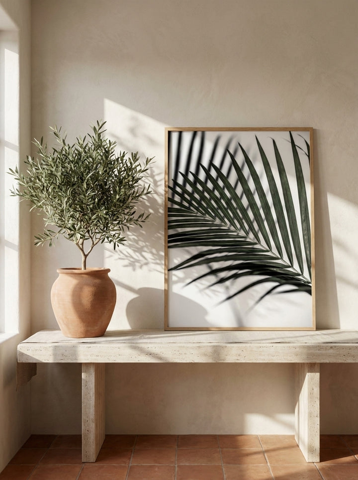 Modern wall art print standing on a console in a Mediterranean home office