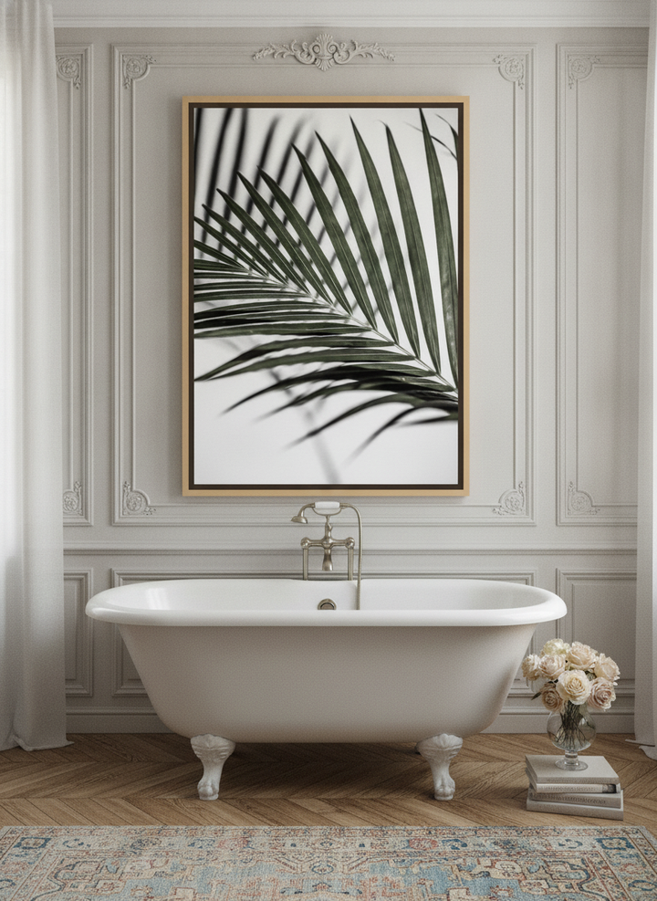 Oversized statement canvas wall art with a natural timber surround styled on the wall in a Parisian bathroom