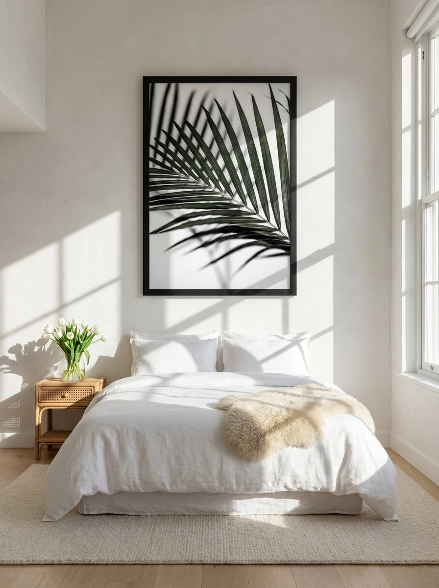 Oversized statement modern wall art print styled on the wall in a bright Scandinavian bedroom
