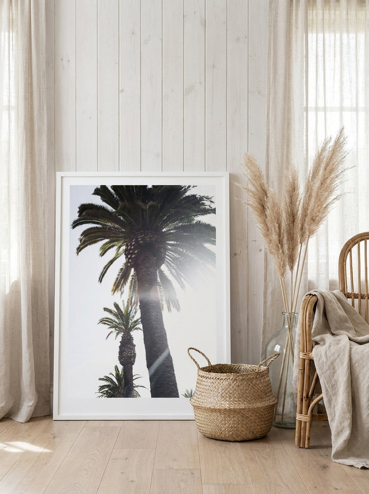 Modern wall art print leaning against the wall in a coastal living room
