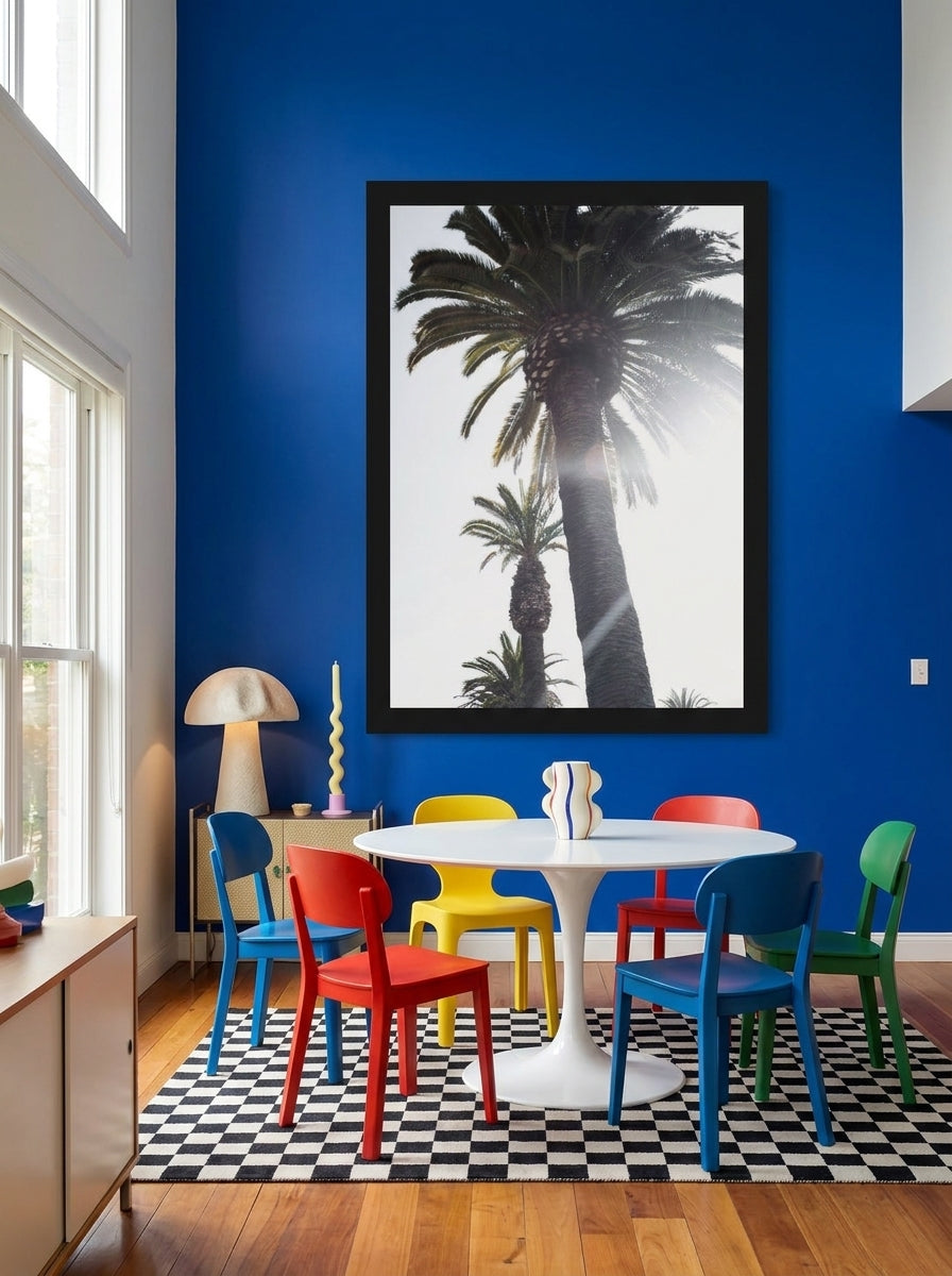 Oversized statement modern wall art print styled on the wall in a colourful eclectic dining room
