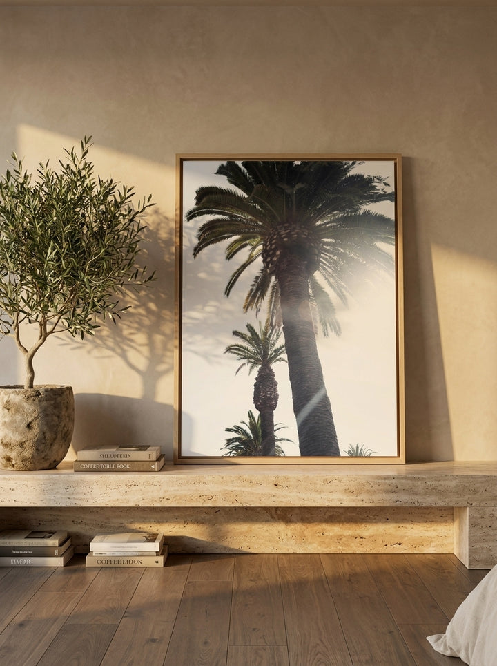 Canvas wall art with a natural timber surround standing on a console in a luxe bedroom