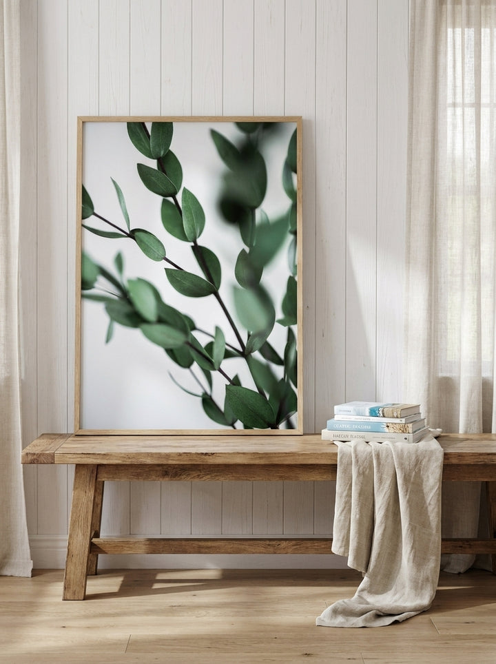 Modern wall art print standing on a kitchen bench in a coastal kitchen