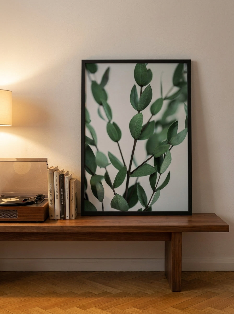 Modern wall art print standing on a kitchen bench in a mid-century kitchen