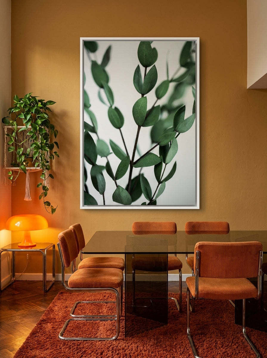 Oversized statement canvas wall art with a white surround styled on the wall in a retro 70s dining room