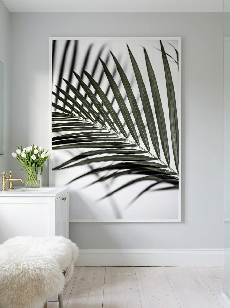 Modern wall art print styled on the wall in a bright Scandinavian bathroom