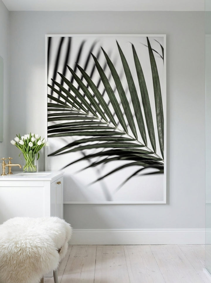 Modern wall art print styled on the wall in a bright Scandinavian bathroom
