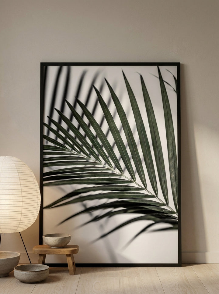 Oversized statement modern wall art print leaning against the wall in a warm Japandi bedroom
