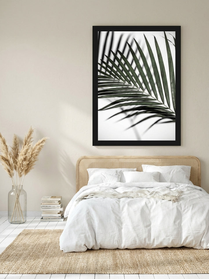 Oversized statement modern wall art print styled on the wall in a coastal bedroom
