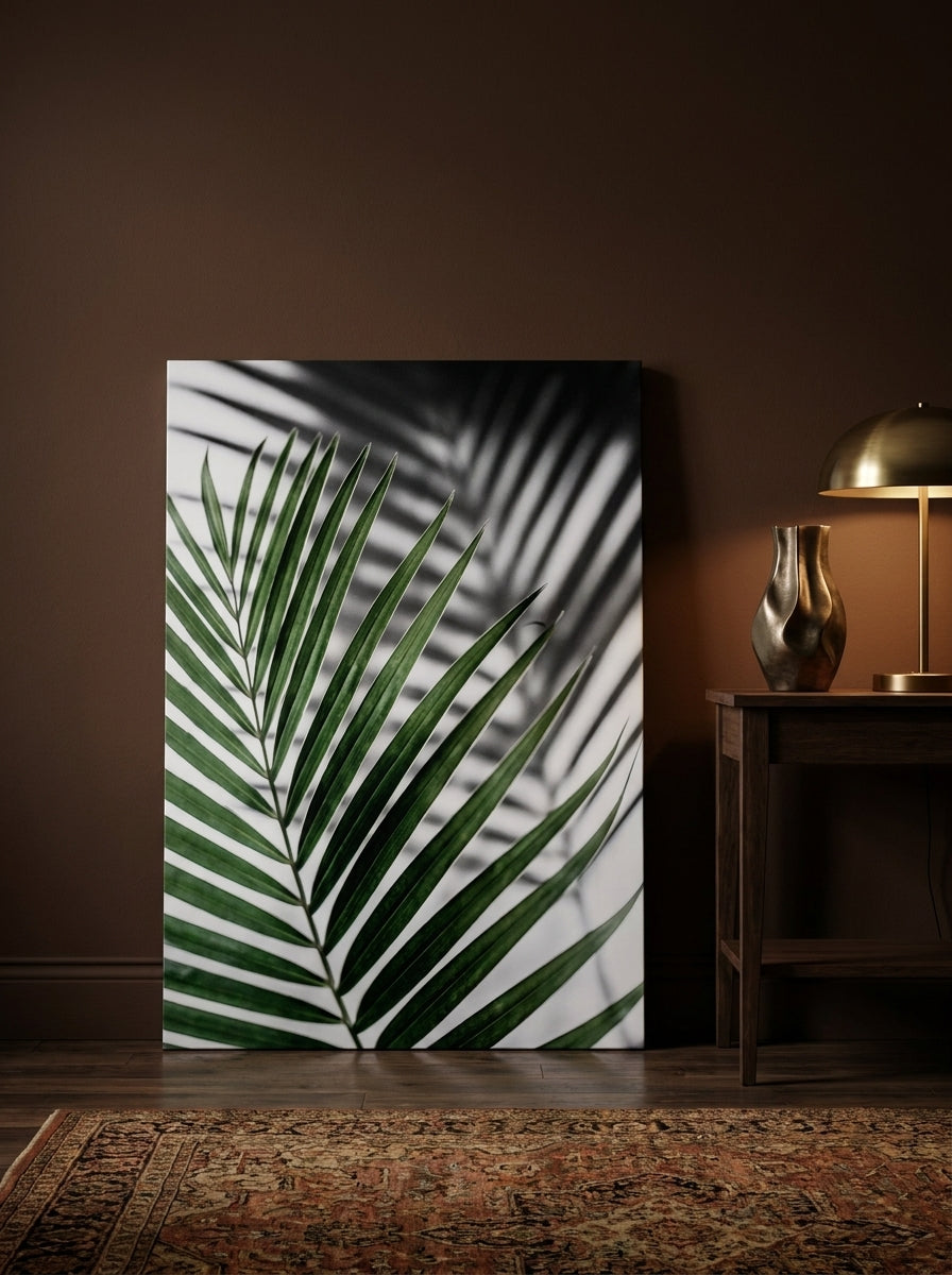 Stretched canvas wall art leaning against the wall in a moody bedroom
