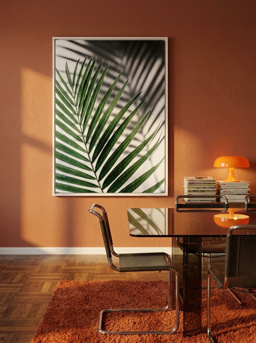 Oversized statement canvas wall art with a white surround styled on the wall in a retro 70s dining room